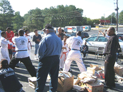 Participants half way through, breaking 571 boards in an hour at the 2007 Break A Thon.