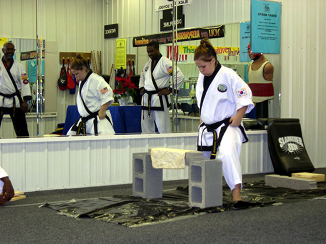 1st Dan Katie at her Black Belt Test